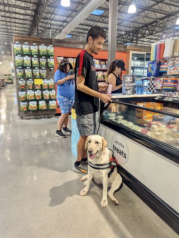 Children with Autism with service dog trained by El Junior at Casper’s Camp Hope Dog Training Gainesville FL